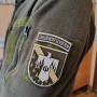 Шеврон ХНУПС з тризубом Caelum incipit ex nostrum олива