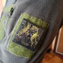 Шеврон Хто сміється в такому місці, той уже адаптувався