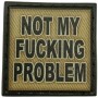 Шеврон Not my fucking problem олива